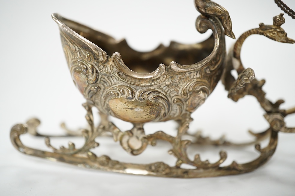 A modern continental silver sleigh with putto and reindeer, import marks for London, 1974, 16cm. Condition - poor